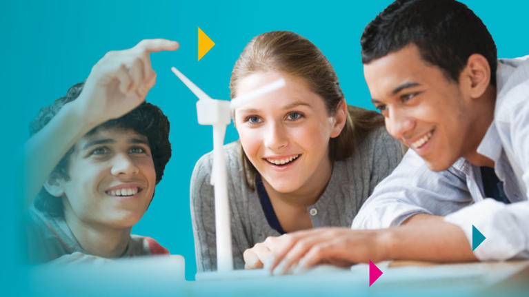 Students with a model of a wind turbine.