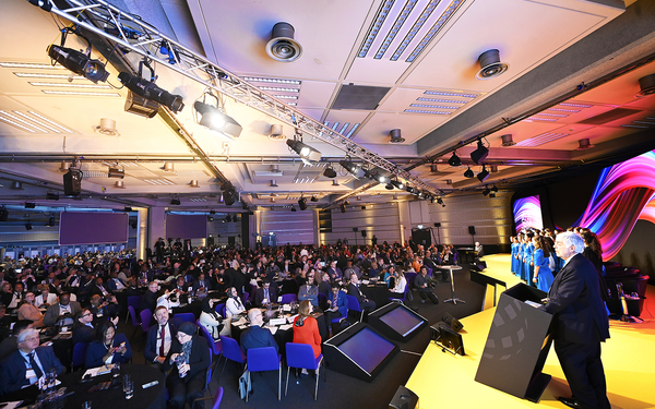 People listening to speech at the EWF 2024. 