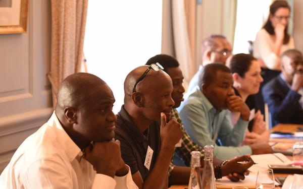 EdTech fellows sit in a lecture