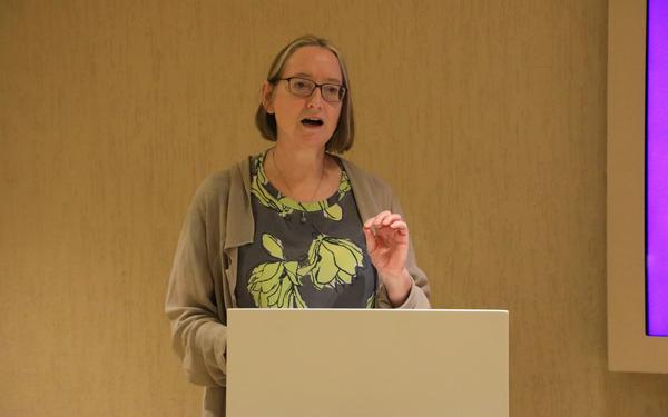 Christine Ozden speaking at COP28