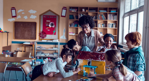 Young students in art class with teacher