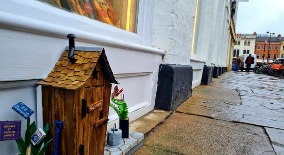 A 'Dinky Door' miniature sculpture outside Cambridge University Press Bookshop