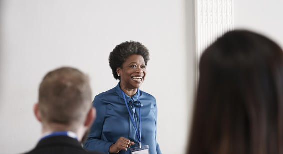 Woman presents to audience