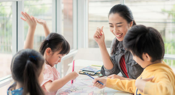 Teacher with young learners