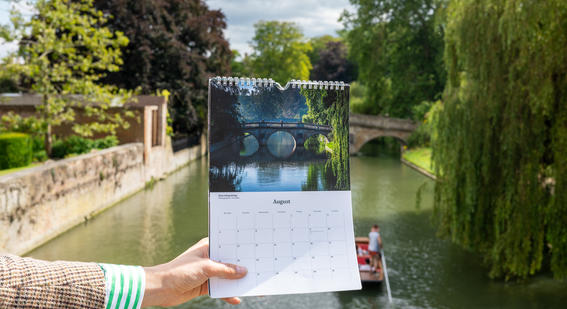 August page of the 2025 calendar on the foreground of the River Cam