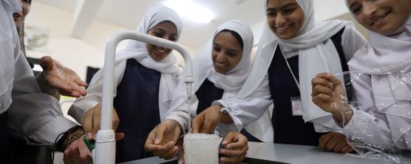 omani students doing a science experiment