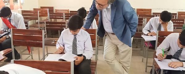 Children sit test in Pakistan classroom